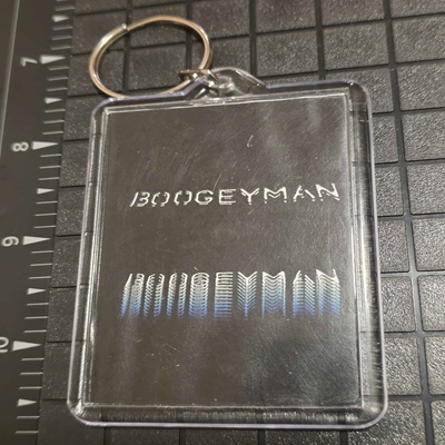 Boogeyman side of the serialized NFC keychain
